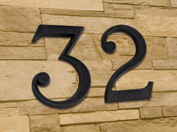Numero civico in bronzo fuso